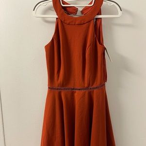 Dark orange mini dress with beautiful lace details